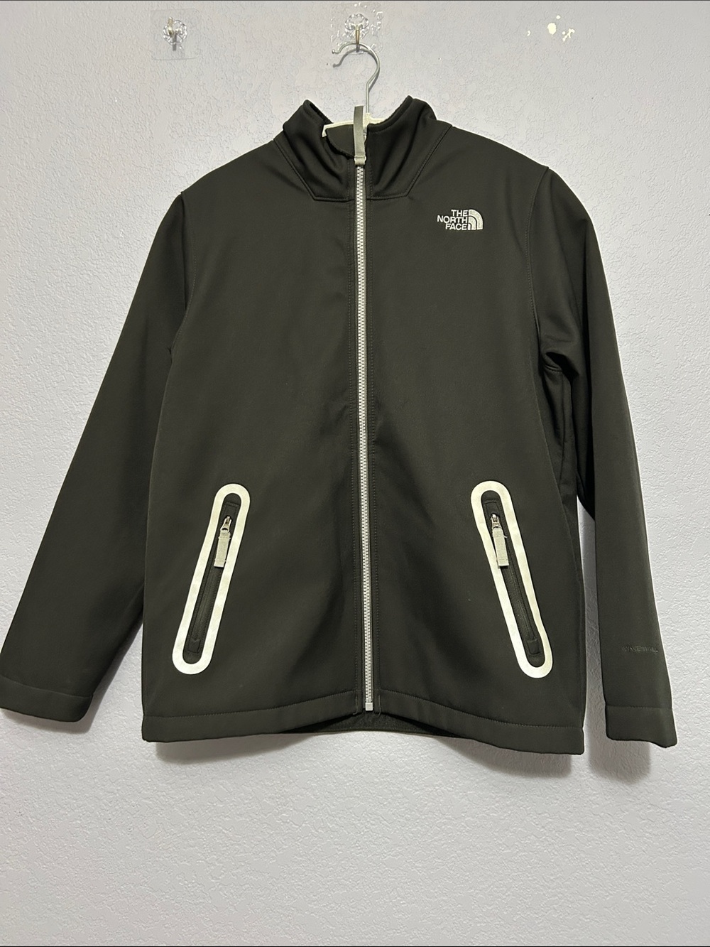 The North Face Kids Black Softshell Raincoat with White Trim